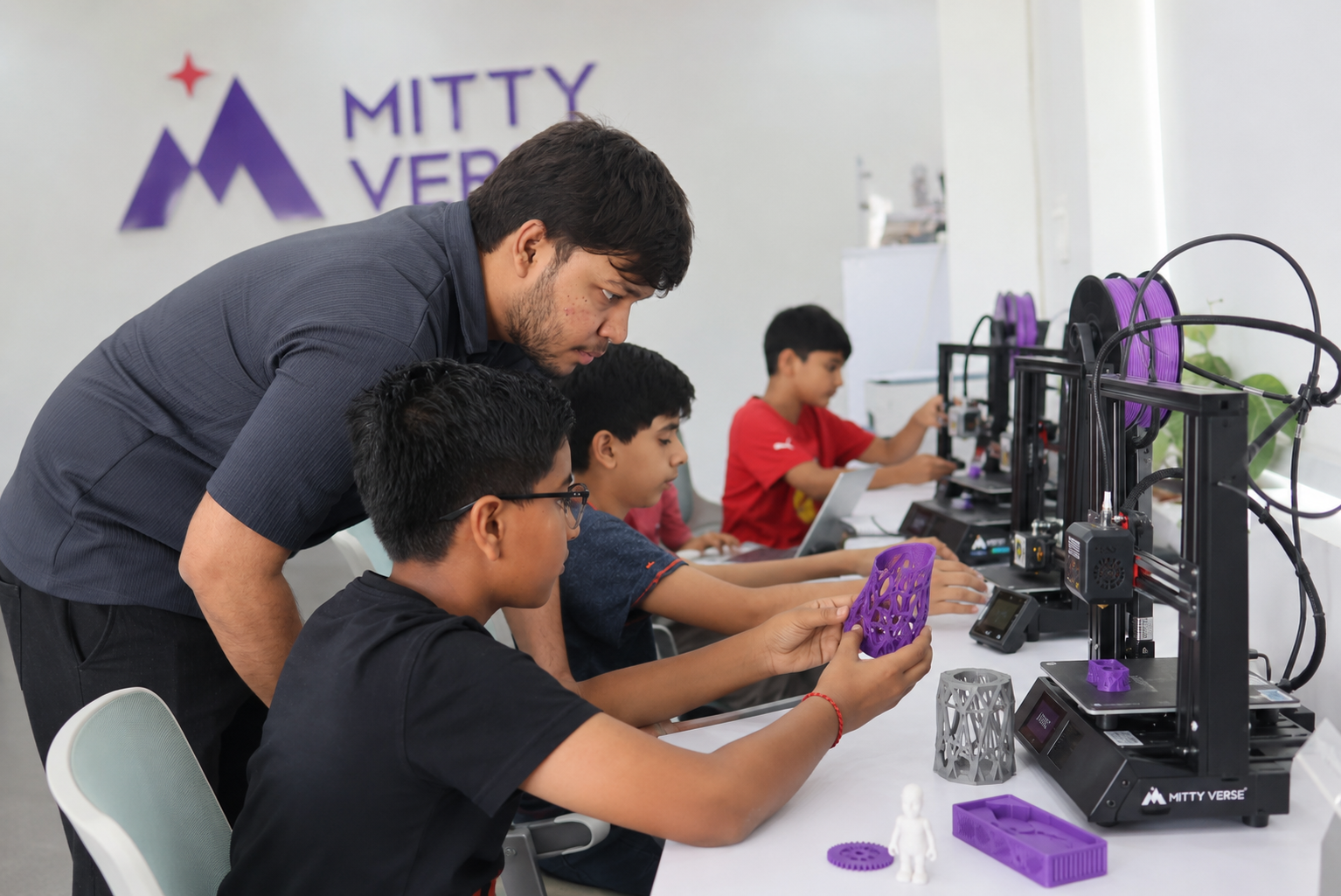 Student using a 3D printer at MittyVerse STEAM makerspace in Gurugram