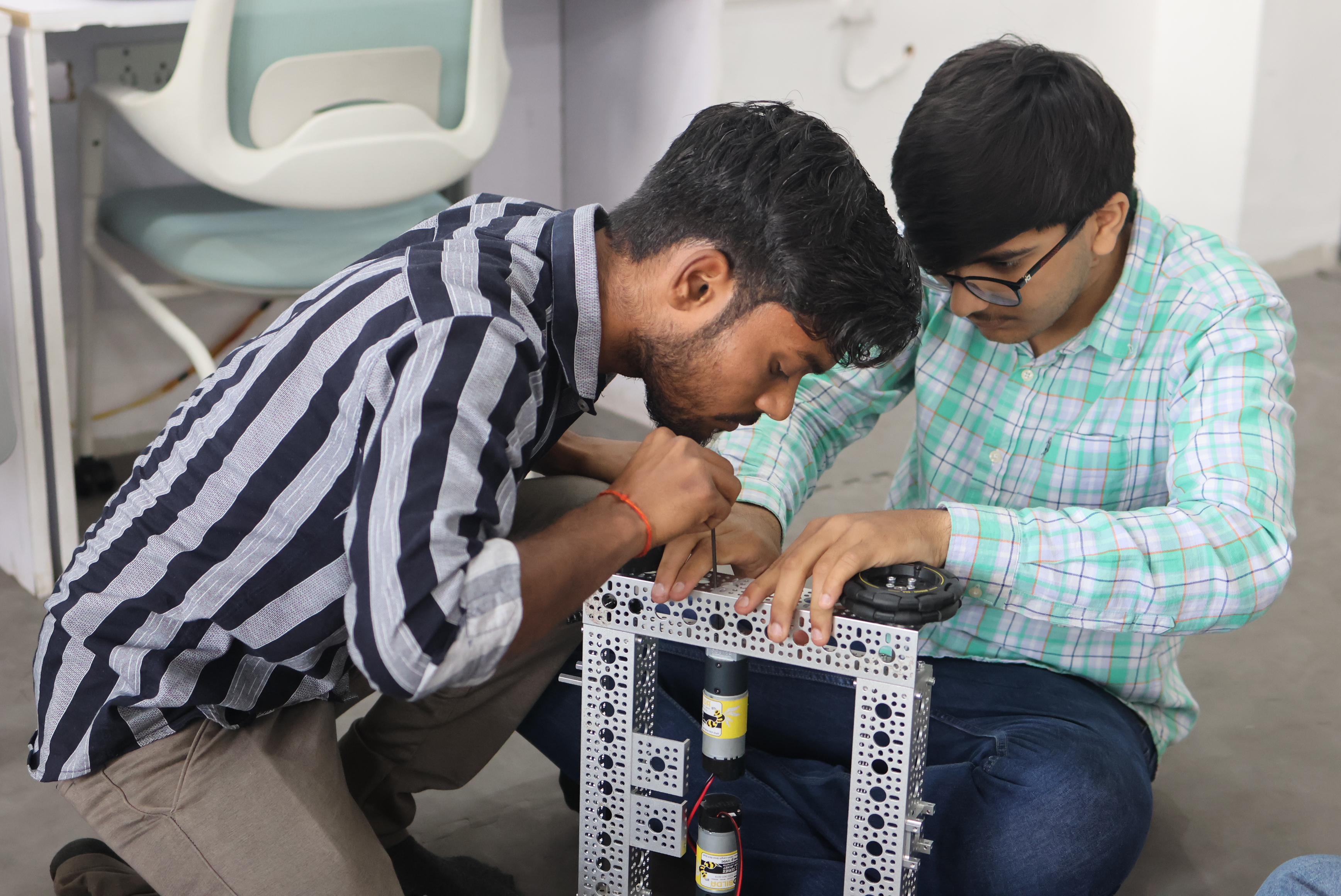 Young child building a robot kit at MittyVerse STEAM learning centre Gurugram